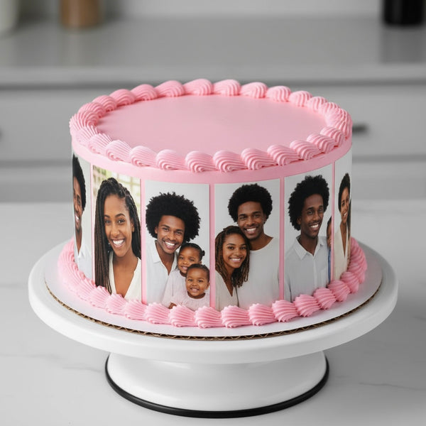 Cake with pink frosting and family photos on a white cake stand.